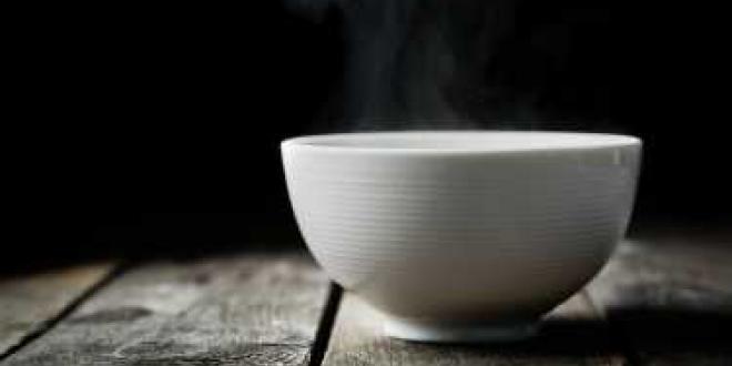 A bowl of steaming bone broth.